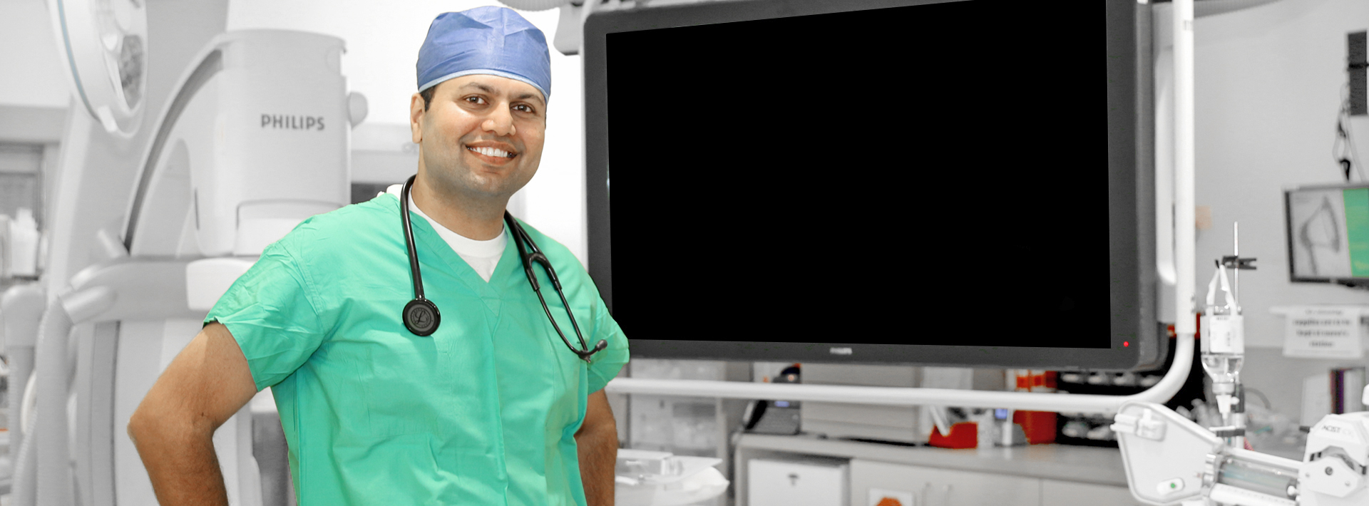 Vikas Soma, MD, FAAC standing in operating room